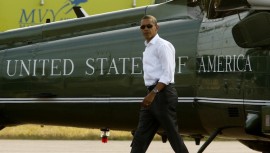 U.S.  President Barack Obama walks from Marine One upon his arrival in Martha’s Vineyard in Massachusetts